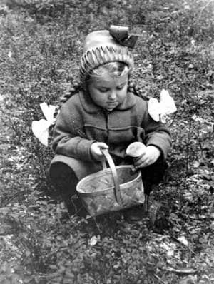 Svetlana and her father picking the first mushrooms